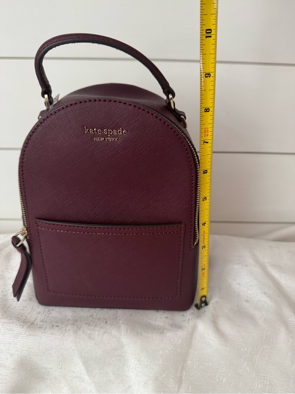 Kate Spade Cameron Mini Convertible Leather Backpack in the color cherrywood - Picture 10 of 11